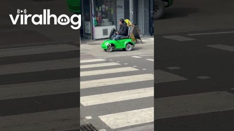 Man Drives Toy Car On London Sidewalk || ViralHog