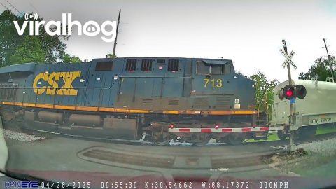 Car Crosses Tracks Before Passing Train || ViralHog