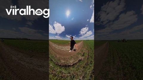 Man Nearly Hit by Giant Spraying Tractor Arm While Walking Through Field || ViralHog