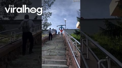 Man Climbs Stairs While Balancing a Person on His Head || ViralHog