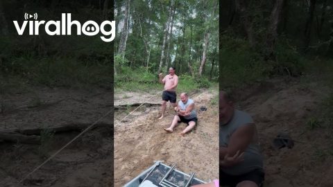 Dad and Stepson Laughing and Slipping on a Sandy Hill || ViralHog