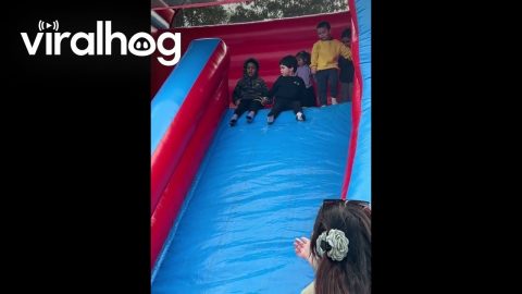 Boy's Kind Hand Makes Slide Less Scary || ViralHog