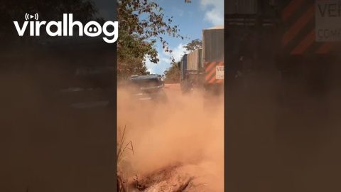 Truck Gets Stuck on Narrow Dirt Road Going Around Semi || ViralHog