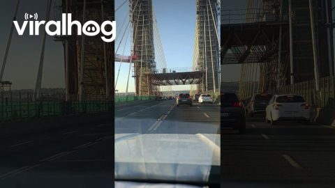 Portable Toilet Falls From Construction Crane Over Centenary Bridge || ViralHog