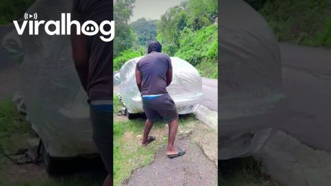 Shrink Wrapping Car To Protect From Hurricane Mellissa || ViralHog
