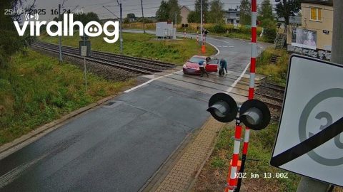 Car Wheel Falls Off on Train Tracks as Train Approaches in Poland || ViralHog