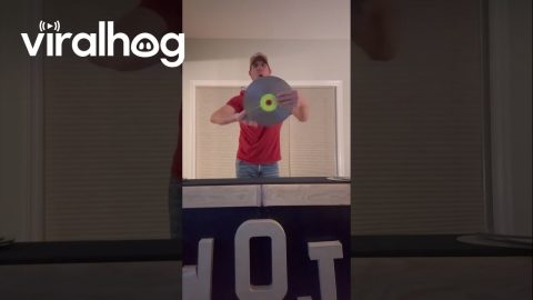 Father and Daughter Vanishing Laserdisc Magic Trick || ViralHog