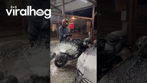 Biker Getting Sprayed in a Car Wash || ViralHog