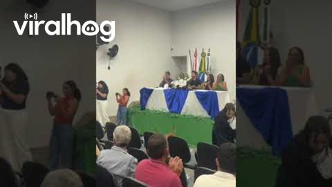 Two Playful Dogs Crash Graduation Ceremony || ViralHog