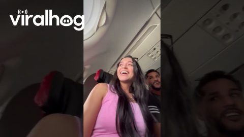 Woman Hugs Arm of Someone Else's Husband During Turbulence || ViralHog