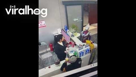 Woman Startled by Ultraman Entering Shop || ViralHog