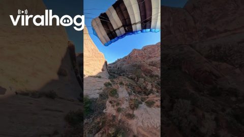 Base Jump Through a Crack || ViralHog