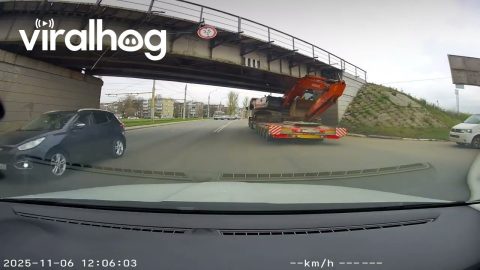 Truck Gets Lodged Under Low Railway Bridge || ViralHog