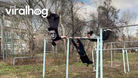 Three Person "Helicopter" on Horizontal Bar || ViralHog
