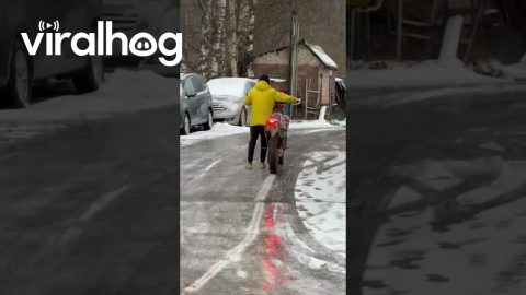 Motorcycle Slides Up Slippery Road || ViralHog