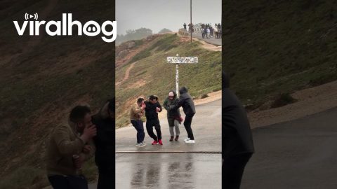 Sudden Windstorm Knocks People Off Their Feet || ViralHog