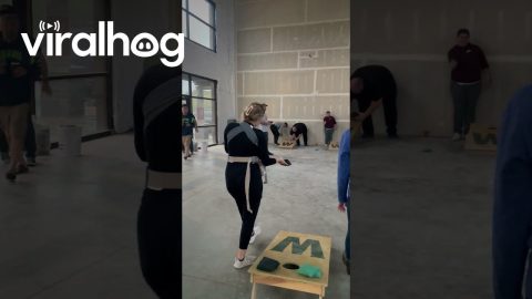 Multitasking Mom Nails Cornhole While Feeding Her Newborn || ViralHog
