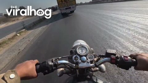 Biker Almost Crashed While Riding Beside a Truck || ViralHog