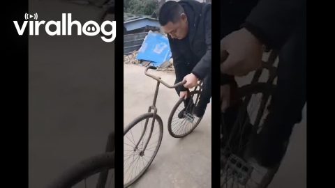 Man Attempts to Ride Split Bicycle || ViralHog