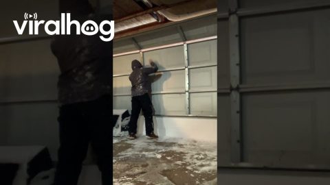 Garage Doorway Completely Blocked by Wall of Snow || ViralHog