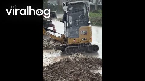 Construction Worker Uses Plastic Wrap to Stay Dry || ViralHog