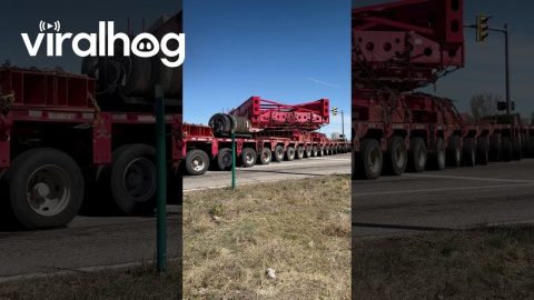 Massive Generator Convoy Navigates Tight Streets || ViralHog
