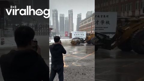 Snowplow Sprays Dirty Slush Onto Parked Car || ViralHog