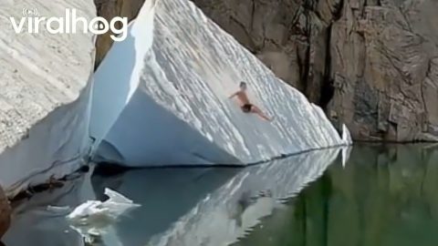 Iceberg Slide Cold Plunge || ViralHog