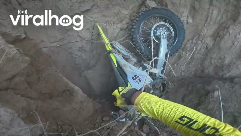 Dirt Bike Goes Over Cliff, Rider Does Not || ViralHog