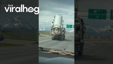 Tall Tank Almost Takes Out Traffic Light || ViralHog