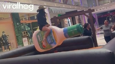 Girl Rides a Giant Bottle of Hidden Valley Ranch Dressing || ViralHog