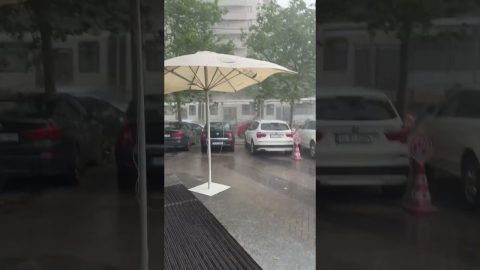 Stormy Winds Push Umbrella Into Car || ViralHog