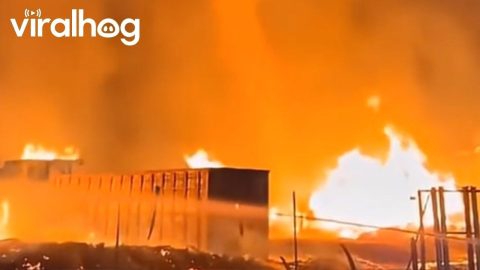 Fire Tornado Rises From Industrial Blaze in Spain || ViralHog