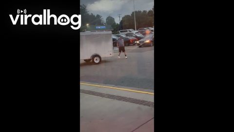 Wind Blows Loose Trailer in Parked Car || ViralHog