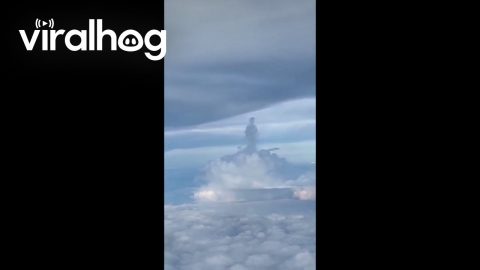 Passenger Captures Man-Like Figure in the Clouds || ViralHog