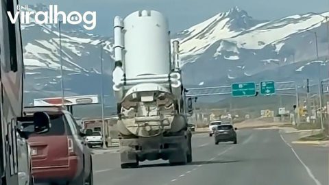 Tall Tank Almost Takes Out Traffic Light || ViralHog