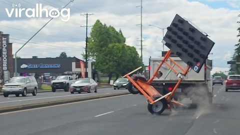Improperly Secured Construction Sign Rolls Into Traffic || ViralHog