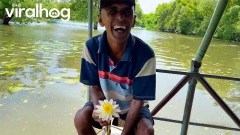 Man Turns a Water Lily Into a Necklace || ViralHog